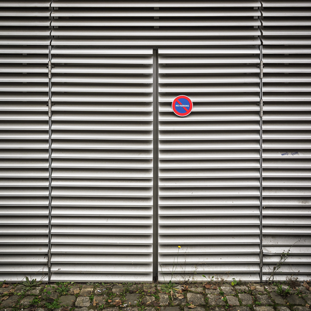 Double porte en lamelles d'aluminium avec interiction de stationnement...