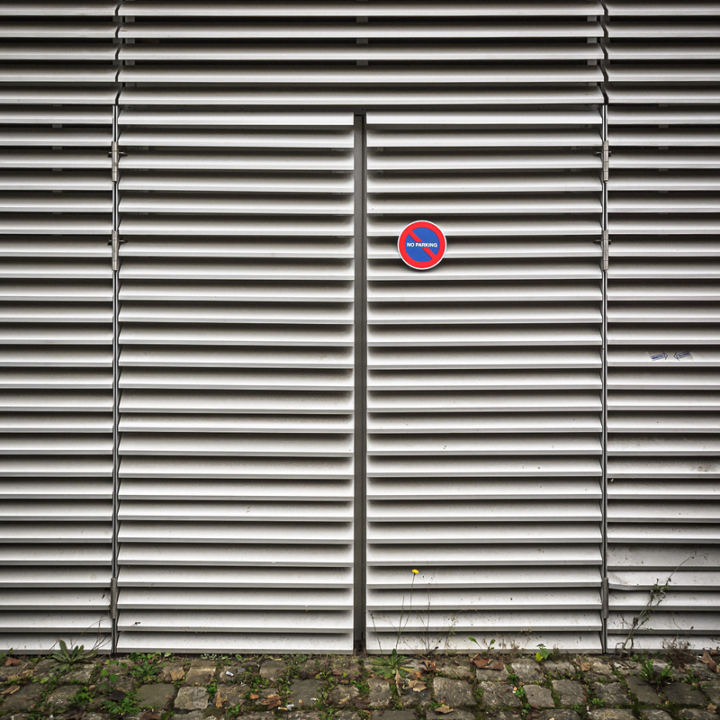 Double porte en lamelles d'aluminium avec interiction de stationnement...